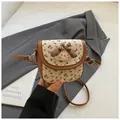 Cute floral canvas small crossbody bag featuring a cartoon puppy plush and brown leather strap - Brown Flower