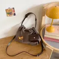 Dark brown canvas bucket bag with cute bear patch and adjustable crossbody strap - Small / Brown