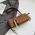 Retro brown contrast patchwork baguette shoulder bag with beaded wood charm detail - With Pendant / Brown