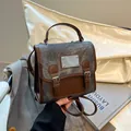 Grauer Canvas und braunes Leder Vintage Mini-Rucksack für Damen mit Metallschnallen - Schwarz