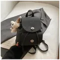 Vintage black lychee leather backpack with silver twist locks and plush bear charm - With Charm / Black