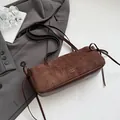 Dark brown suede baguette bag with leather bow drawstring and gold logo details - No Pendant / Brown