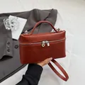 Baksteenrode mini-box tas met krokodillenprint, handvat en verstelbare riem - Oranje