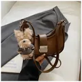 Caramel crescent shoulder bag in textured PU leather with a cute teddy bear charm - Brown with Pendant