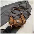 Retro brown contrast color half-moon crossbody bag with suede and leather textures - No Pendant / Brown