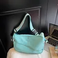 Minimalist mint green large capacity nylon crossbody bag with adjustable buckle strap - Light Blue