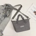 Fashionable medium gray nylon crossbody square bag with woven handle and adjustable strap - Gray