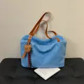 Sky blue plush tote bag with brown faux leather straps and a cute teddy bear charm - Blue with Pendant