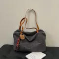 Chic dark grey faux shearling tote bag with brown straps and cute bear charm pendant - Grey With Pendant