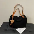 Black fuzzy sherpa tote bag with brown leather straps and a cute plush bear charm - Black With Pendant