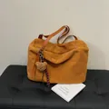Brown teddy fur tote bag with leather straps and a cute plush bear charm accessory - Brown with Pendant