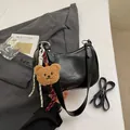 Black glossy underarm bag with plush bear charm and adjustable shoulder strap - Style With Plush Bear Pendant / Black