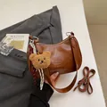 Brown vintage pillow shoulder bag with plush bear charm and detachable strap - Style With Plush Bear Pendant / Brown