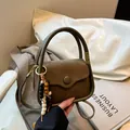 Retro coffee brown suede handbag with chic beaded charm and detachable shoulder strap - Green