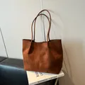 Minimalist large brown suede tote bag in caramel finish with vertical stitching detail - Brown