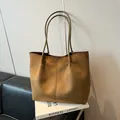 Brown suede large tote bag with minimalist vertical stitching and slender handles - Green