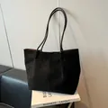 Minimalist black oversized tote bag in soft matte suede finish with stitching details - Black