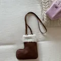 Detailed view of Christmas boot bag in brown suede with white faux shearling trim - Brown