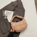 Chic beige quilted puffer shoulder bag with a padded texture for daily urban fashion - Khaki