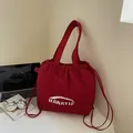 Dark red drawstring canvas tote bag with white logo and wide shoulder straps - No Pendant / Red