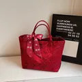 Red Chinese-style tote bag with floral lace patterns and festive silk ribbon detail - S / Red