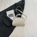 Retro cream white shell handbag with glossy trim and a detachable shoulder strap - No Pendant / Off White