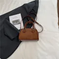 Brown vintage style Boston bag in suede and leather finish with adjustable strap - No Pendant / Brown