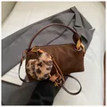 Dark brown suede-textured barrel bag with leopard heart charm and wide shoulder strap - With Pendant / Suede Coffee