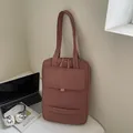 Chic brick red quilted laptop bag with vertical stitching and top handles for commuting - Brick Red