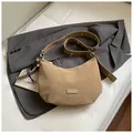 Vintage khaki matte hobo crossbody dumpling bag featuring a trendy metal eyelet strap - With Pendant / Khaki