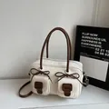 Fashionable white and brown tote bag with chic bow details and dual front pockets - Off-white