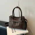 Dark brown canvas and leather crossbody tote bag with vintage silver metal zipper - Brown