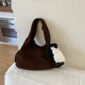Dark brown suede hobo tote bag with a cute penguin plush charm and wide shoulder strap - Coffee With Pendant