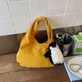 Ginger yellow suede hobo tote bag with wide handle and a cute penguin plush charm - Yellow with Pendant