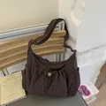 Brown nylon crossbody bag with beige grid pattern and adjustable shoulder strap - Brown