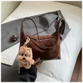 Dark brown faux suede leopard hobo bag with plush dog charm and smooth strap - Coffee With Pendant
