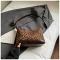 Fashionable leopard print suede underarm bag with dark brown leather straps and accents - Leopard Brown Without Charms