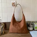 Brown faux suede hobo tote bag with vertical stitching for casual autumn commute - Brown