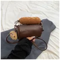 Brown PU leather barrel bag with plush bread handle and cute cookie pendant charm - Brown