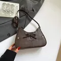 Chic dark brown faux leather underarm bag with bow decoration and silver rivets - Brown