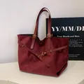 Retro burgundy faux suede tote bag with slim shoulder straps and gold buckles - Red