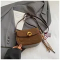 Retro brown suede crossbody bag with bronze buckle and leopard bear charm details - Coffee With Pendant