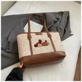 Borsa tote in tela beige a pois rosa con simpatico ricamo di cucciolo di peluche - Marrone