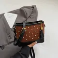 Brown frosted bucket bag with quilted rhinestones and black faux leather contrast strap - Brown
