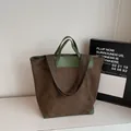 Brown corduroy tote bag with olive green leather trim and dual shoulder straps - Green