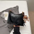 Glossy black half-moon tote bag with detachable strap and plush alpaca charm accessory - With Pendant / Black