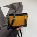 Yellow and black frosted bucket bag with diamond stitching and rhinestone details - Yellow