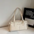 Minimalist cream white PU leather tote bag with decorative drawstrings and dual straps - White