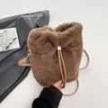 Brown faux fur bucket bag with gold hardware and stylish drawstring closure - Brown