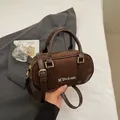 Brown vintage bowling bag in suede and leather with adjustable strap and gold hardware - No Pendant / Brown